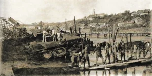 Гродненское “Эльдорадо”: как хитрый инженер вытащил деньги со дна Немана и из государственного бюджета 1920, Гродно. Разрушенный железнодорожный мост через Неман, уничтоженный бронепоезд, на заднем плане деревянный мост, построенный польскими саперами. Фото: Hrodna 11:27