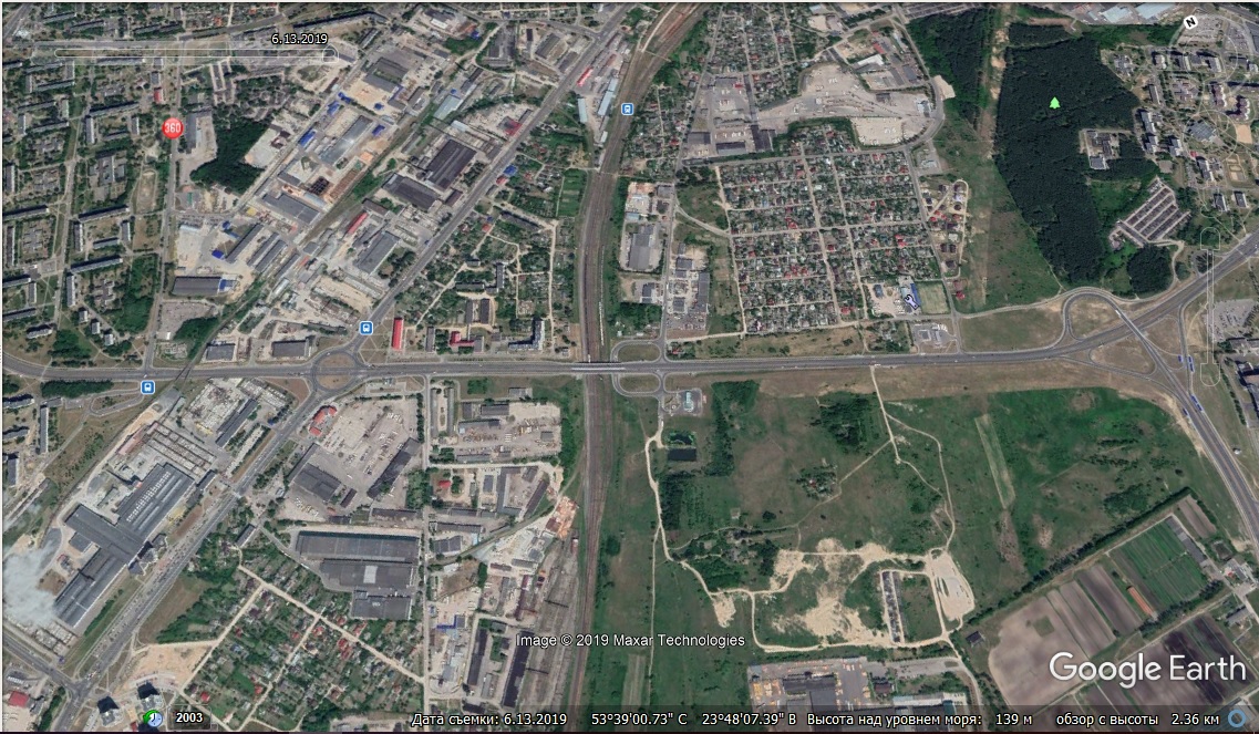 Панэлькі замест палёў, гандлёвыя цэнтры на пустках і дарогі на месцы сцяжынак. Як рос Гродна апошнія 17 гадоў